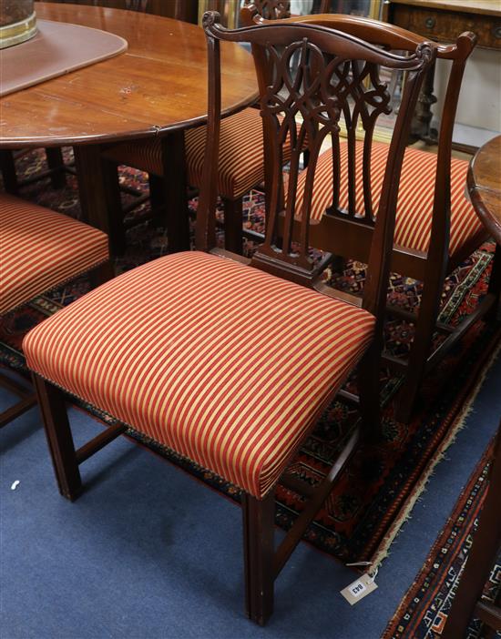 A set of twenty four Chippendale style dining chairs